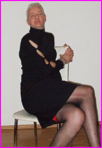Tragic sissy loser Murat in a black dress