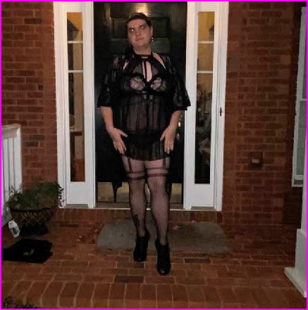 Sissy Emma steps outside in black babydoll nightie