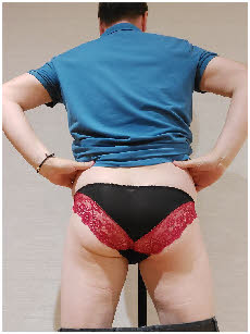 Slutty faggot Paul shows off his arse in red and black knickers Slutty faggot Paul shows off his arse in red and black knickers