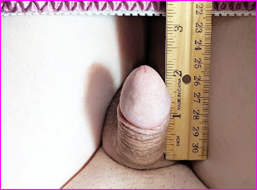 Sissy Beverly's tiny cock measuring up at less than two inches Sissy Beverly's tiny cock measuring up at less than two inches