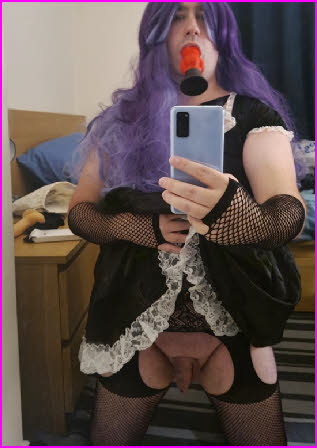 Transvestite maid Amy swallows large vibrator