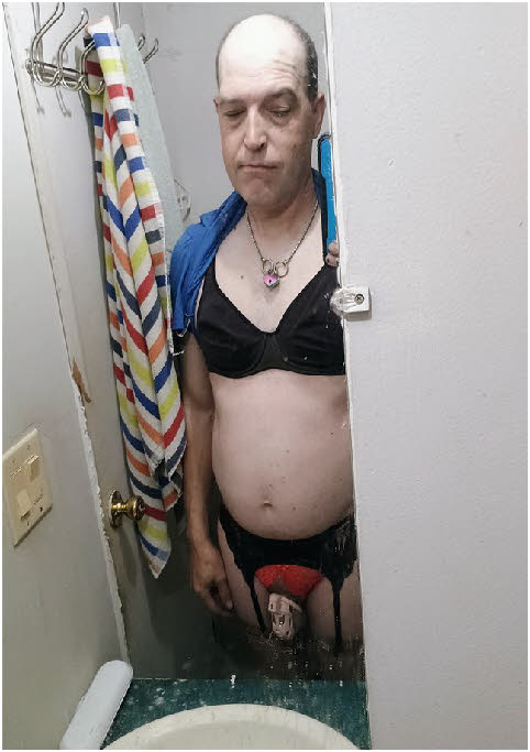 Masculine failure Shaun Taylor wearing a bra, stockings and a chastity cage Masculine failure Shaun Taylor wearing a bra, stockings and a chastity cage