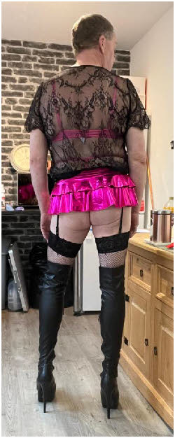 Cross-dressing married man shows off his arse in pink miniskirt