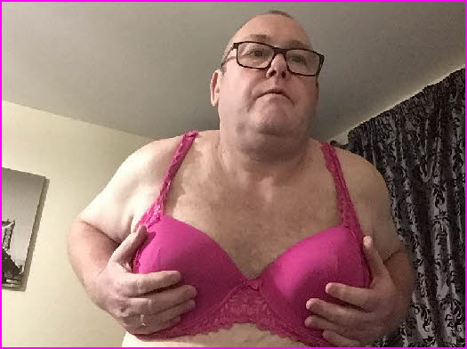 Married sissy loser Rosie Posy looking like a twat in a pink bra
