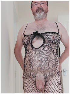 Cross-dressing sissy Paul has his dick hanging out of his split-crotch bodystocking Cross-dressing sissy Paul has his dick hanging out of his split-crotch bodystocking